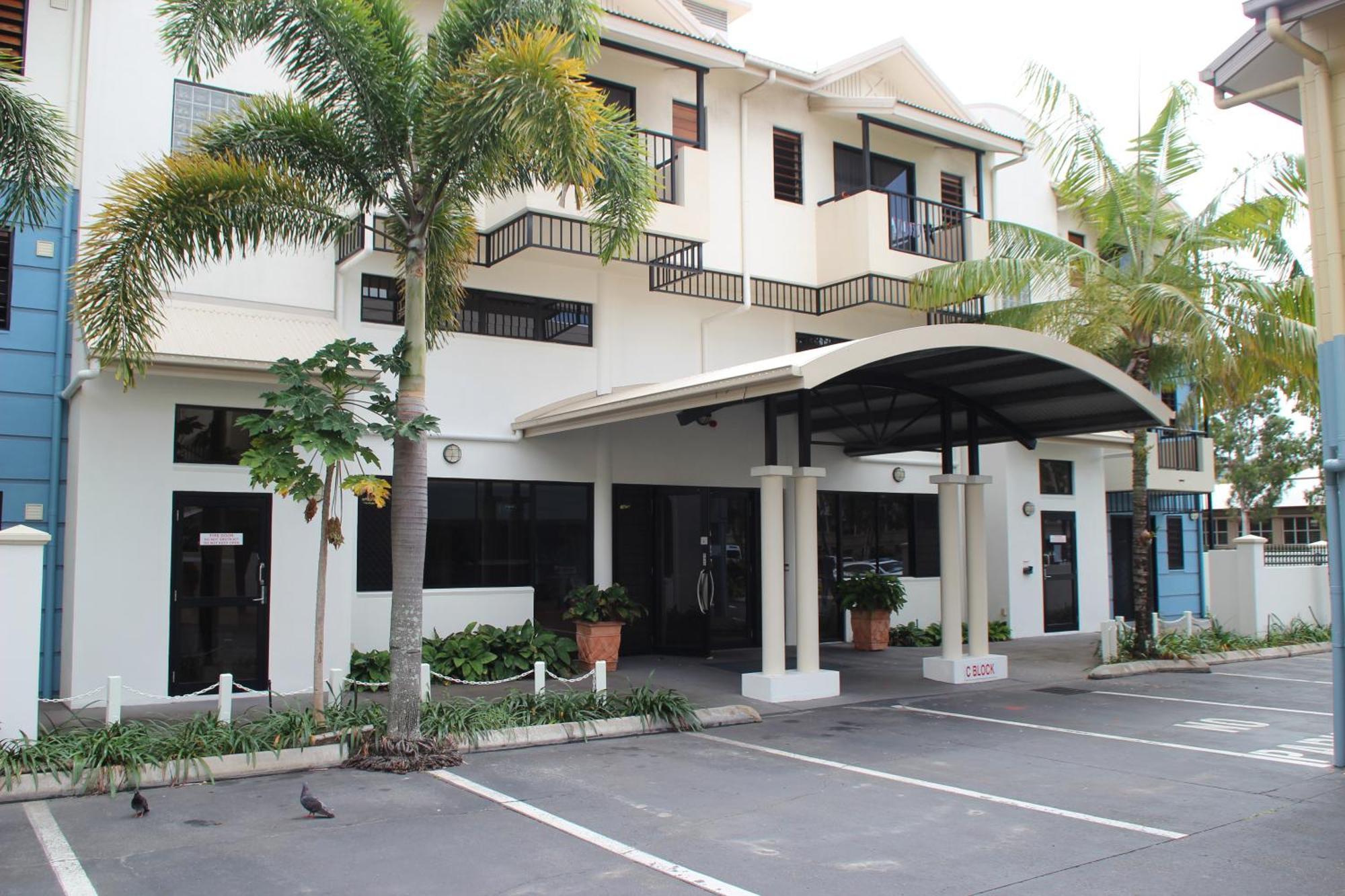 Мотель Cairns Queens Court Экстерьер фото